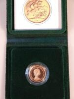 Coins. A 1980 proof sovereign