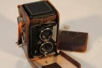 A Rolleicord TLR camera.