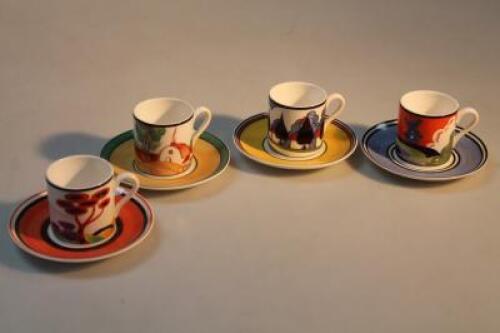 Four Wedgwood Clarice Cliff coffee cups and saucers.