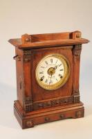 A Fattorini & Sons oak cased mantel clock