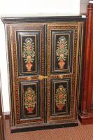 *A continental painted pine two door cupboard