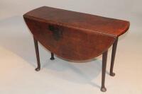 An 18thC pad foot drop leaf table