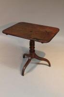 An 18thC rectangular tilt top tripod table.