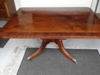 A 19thC mahogany and rosewood band veneered tilt top breakfast table