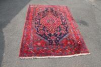 A 20thC Persian style rug