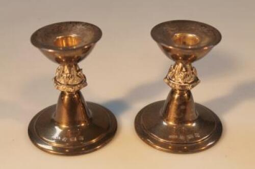 A pair of Elizabeth II silver dwarf candlesticks