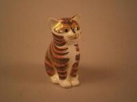 A Royal Crown Derby paperweight of a cat