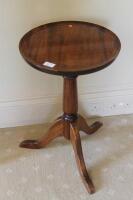 A Georgian style mahogany tripod wine table