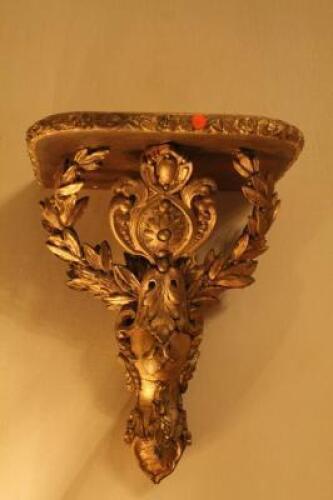 A pair of mid-Victorian gilt plaster wall brackets