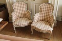 A pair of Louis XV style painted fauteils