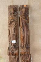 A pair of 19thC carved oak appliques