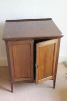 An Edwardian mahogany two door cabinet