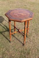 An Edwardian satinwood occasional table