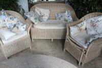 A Lloyd Loom style wicker conservatory three piece suite. (in the orangery).