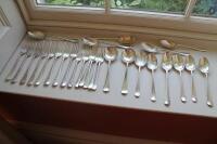 A composite suite of silver rat-tail pattern dessert spoons