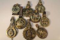 A collection of commemorative horse brasses