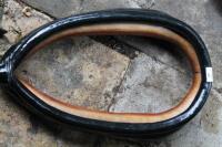 A black leather horse collar