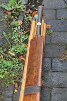 A Gunn and Moore cricket bat and stumps.