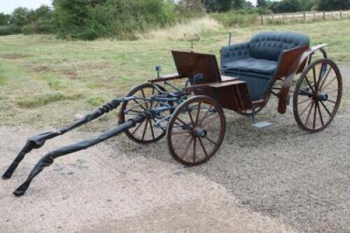 A four wheel horse carriage.