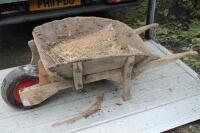 A vintage wooden wheel barrow (AF).