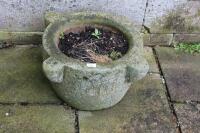 A carved stone jardiniere