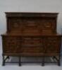 An early 20thC Jacobean revival oak sideboard