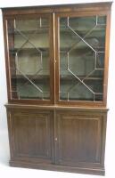 A mahogany bookcase in George III style