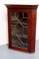 A 19thC mahogany corner wall cabinet