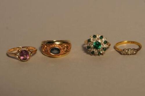 Four dress rings