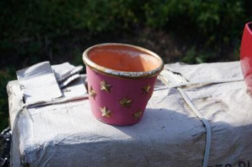 *A pallet of pink pots with gold star detail. Viewing is on site; approx 4miles from Bourne