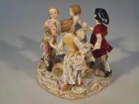 A 19thC Meissen figure group of four dancing children