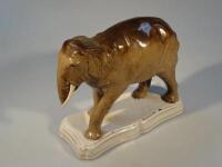 A Staffordshire figure of an Elephant