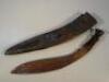 A 19thC Kukri in leather scabbard