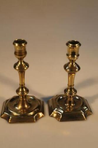 A matched pair of George III brass candlesticks