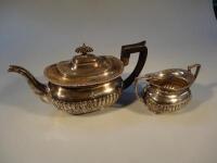 A Victorian silver teapot and matched sugar bowl