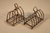 Two silver plated toast racks.