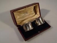 A pair of George V silver napkin rings