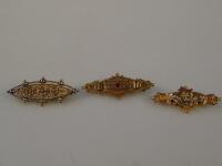 Two 9ct gold Victorian symbolic brooches