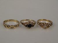 Three 9ct gold stone set dress rings