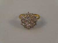 A ladies diamond cluster ring