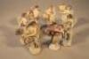 Seven German porcelain figures of angels