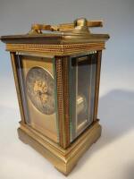 A late 19thC brass carriage clock