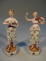 A pair of continental porcelain figures of young women