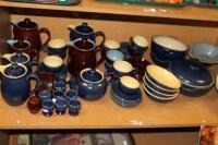 A quantity of Denby blue and brown glazed stoneware.