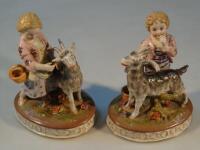 A pair of modern German porcelain figure groups