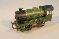 A Hornby wind up clockwork engine in LNER livery.