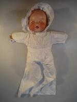 A large Armand Marseille bisque headed bebe doll