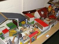 A child's model zoo with related Britain's plastic animals