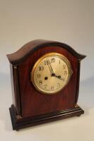 An early 20thC mahogany mantel clock by Waterbury