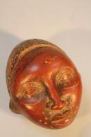 Tribal Art. A terracotta sculpture of a woman's head